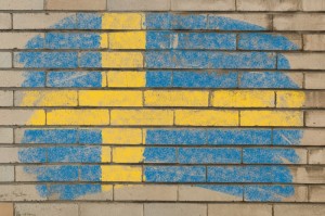 2157240-flag-of-sweden-on-grunge-brick-wall-painted-with-chalk